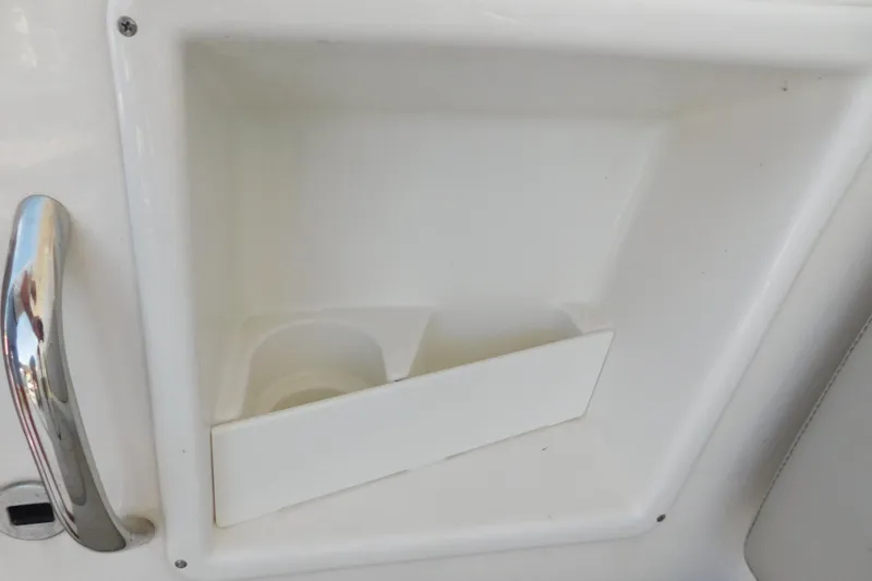  Yacht Photos Pics 2024 Pursuit DC 326 Dual Console cup holder and handle detail.