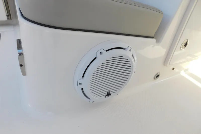  Yacht Photos Pics 2024 Pursuit DC 326 Dual Console boat interior with JL Audio speaker.
