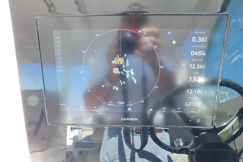  Yacht Photos Pics Garmin navigation display on 2024 Pursuit DC 326 Dual Console boat dashboard.