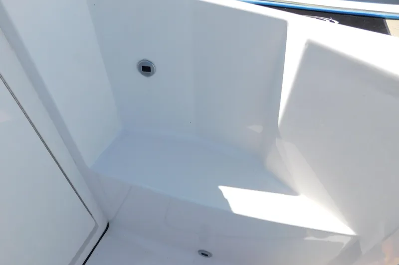  Yacht Photos Pics 2024 Pursuit DC 326 Dual Console interior detail, showcasing sleek white design.