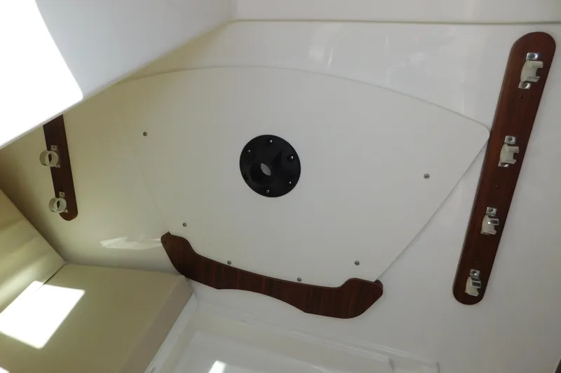  Yacht Photos Pics 2024 Pursuit DC 326 Dual Console interior detail with mounting brackets.