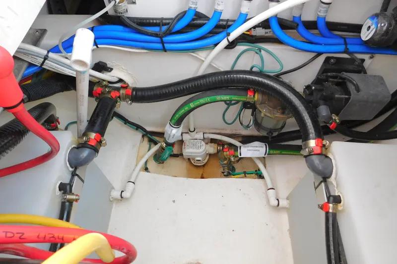  Yacht Photos Pics 2024 Pursuit DC 326 Dual Console boat wiring and plumbing system close-up.
