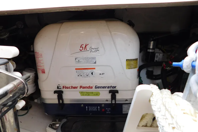  Yacht Photos Pics Fischer Panda generator in 2024 Pursuit DC 326 Dual Console boat engine compartment.