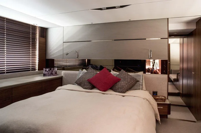  Yacht Photos Pics Luxurious bedroom interior on 2018 Princess S65 yacht with modern design and cozy bedding.