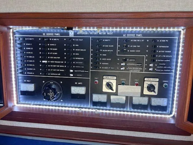 Ronda-vous Yacht Photos Pics Control panel of 1990 Jefferson 42 Viscount Sundeck motor yacht, illuminated with LED lights.
