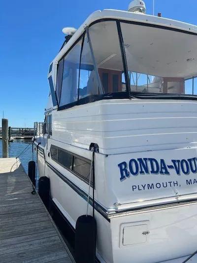 Ronda-vous Yacht Photos Pics 1990 Jefferson 42 Viscount Sundeck yacht docked, featuring "Ronda-Vous" name, Plymouth, MA.