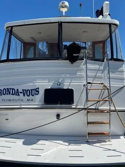 Ronda-vous Yacht Photos Pics 1990 Jefferson 42 Viscount Sundeck yacht with ladder, docked in Plymouth, MA.