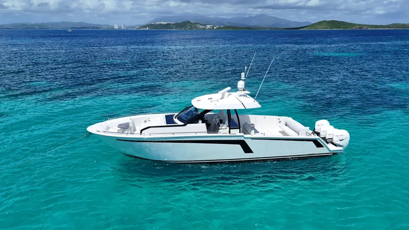 Yacht Photos Pics 2020 Ocean Alexander 45 Divergence Sport yacht on clear turquoise water.