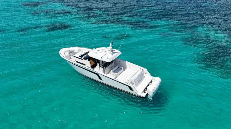  Yacht Photos Pics 2020 Ocean Alexander 45 Divergence Sport yacht on clear turquoise water.