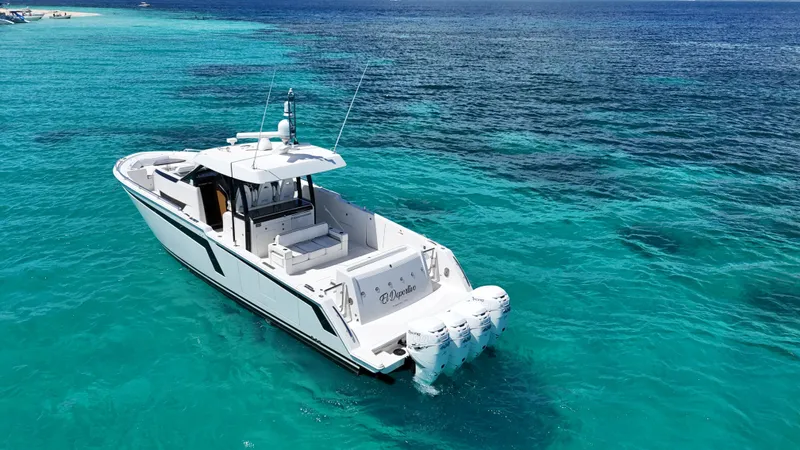  Yacht Photos Pics 2020 Ocean Alexander 45 Divergence Sport yacht on clear turquoise water.