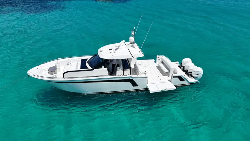  Yacht Photos Pics 2020 Ocean Alexander 45 Divergence Sport yacht on clear turquoise water.