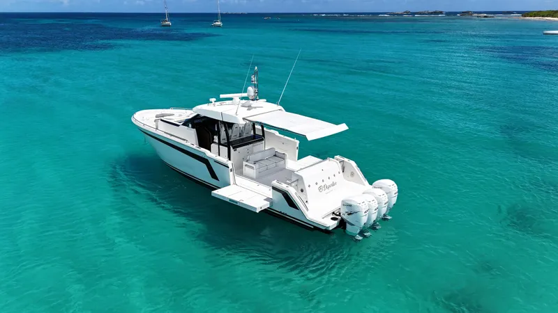  Yacht Photos Pics 2020 Ocean Alexander 45 Divergence Sport boat on turquoise water.