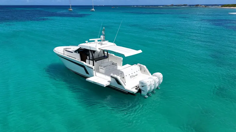  Yacht Photos Pics 2020 Ocean Alexander 45 Divergence Sport boat on turquoise water, featuring triple outboard engines.