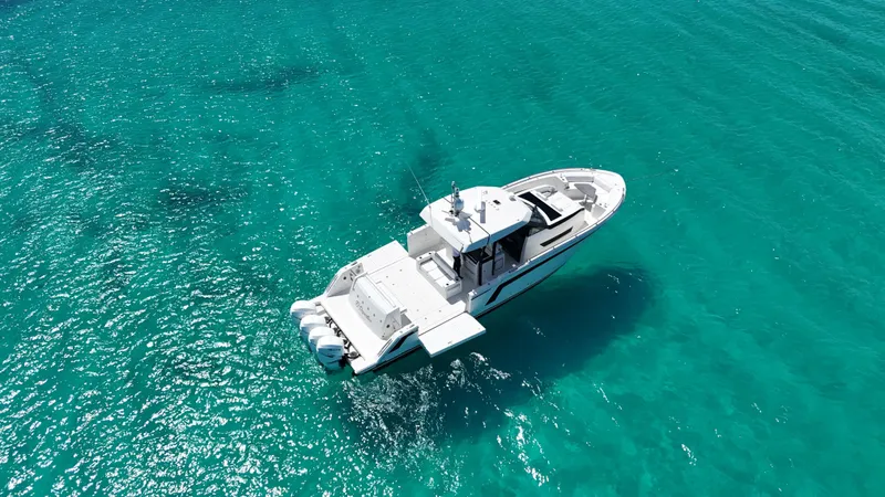  Yacht Photos Pics 2020 Ocean Alexander 45 Divergence Sport yacht on clear turquoise water.