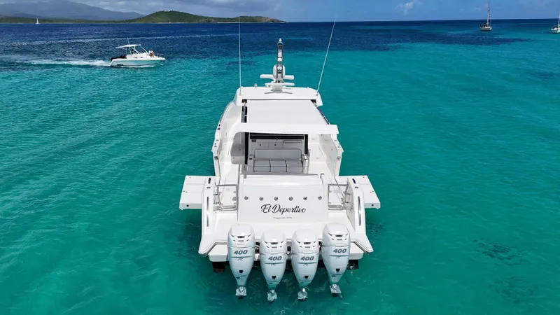  Yacht Photos Pics 2020 Ocean Alexander 45 Divergence Sport yacht on turquoise water, rear view.