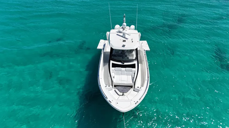  Yacht Photos Pics 2020 Ocean Alexander 45 Divergence Sport yacht on clear turquoise water.