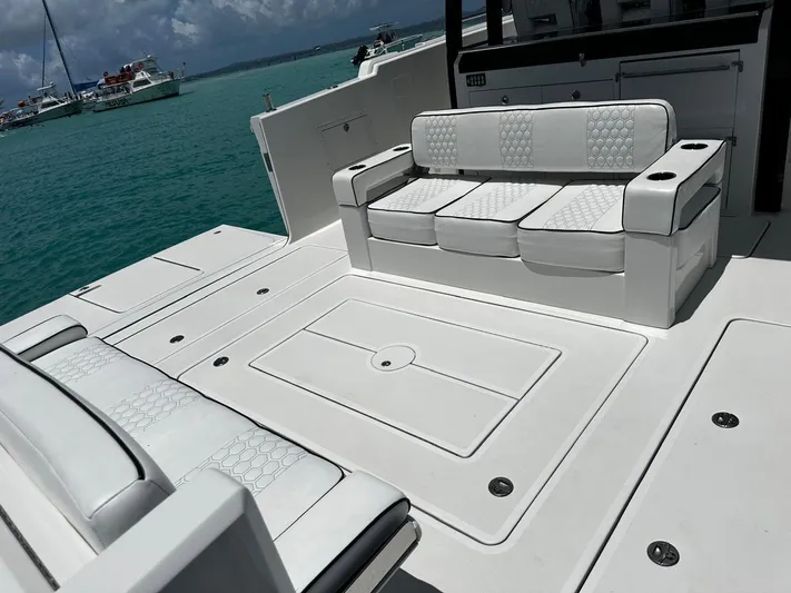  Yacht Photos Pics 2020 Ocean Alexander 45 Divergence Sport boat with white seating and spacious deck.