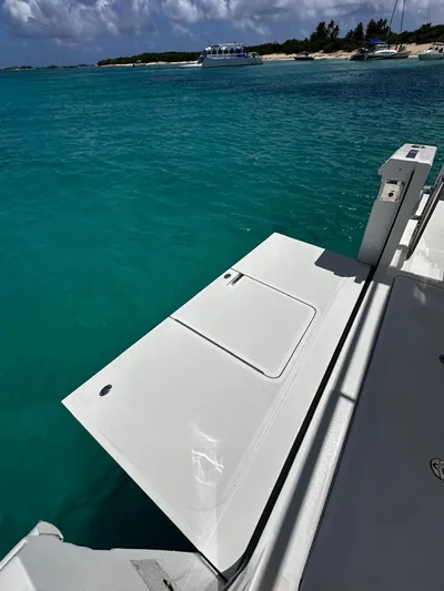  Yacht Photos Pics 2020 Ocean Alexander 45 Divergence Sport yacht platform on turquoise water.