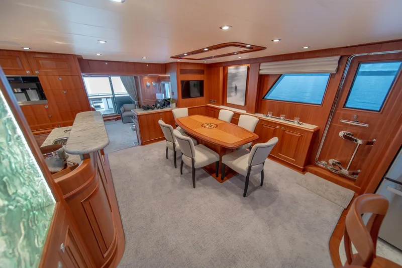 750 Skylounge Yacht Photos Pics Luxurious interior of 2022 Hampton Endurance 750 LRC yacht with elegant dining area.