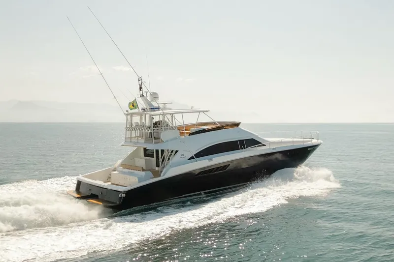 Mare Blu Yacht Photos Pics 2008 Pro Boat Yachts Power Cat 80 cruising on open water, showcasing sleek design and performance.