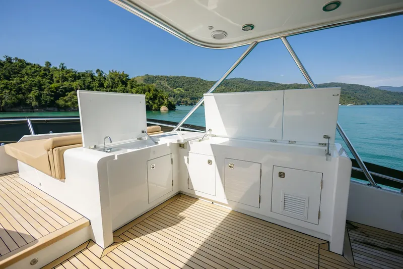 Mare Blu Yacht Photos Pics Luxurious 2008 Pro Boat Yachts Power Cat 80 deck with scenic ocean view.