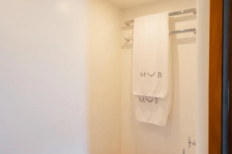 Mare Blu Yacht Photos Pics Towels hanging in a bathroom of a 2008 Pro Boat Yachts Power Cat 80.