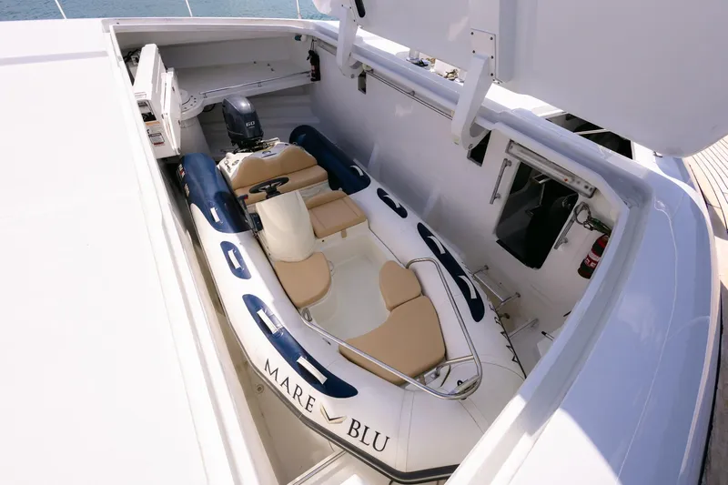Mare Blu Yacht Photos Pics 2008 Pro Boat Yachts Power Cat 80 with inflatable tender in storage compartment.