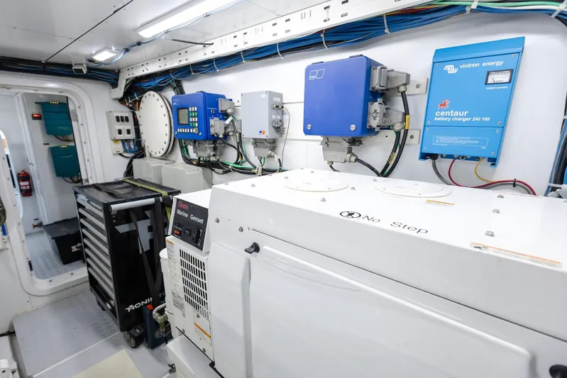 Mare Blu Yacht Photos Pics Engine room of 2008 Pro Boat Yachts Power Cat 80 with electrical equipment and generator.