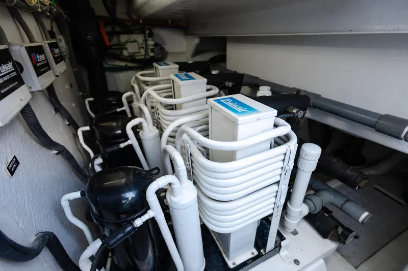 Mare Blu Yacht Photos Pics Engine room of 2008 Pro Boat Yachts Power Cat 80 with Dometic systems.