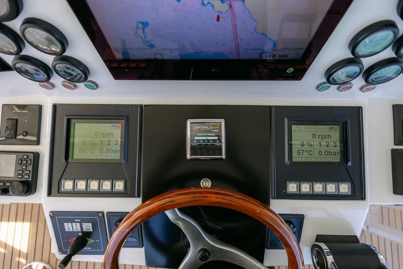 Mare Blu Yacht Photos Pics Control panel of 2008 Pro Boat Yachts Power Cat 80 with navigation and monitoring displays.