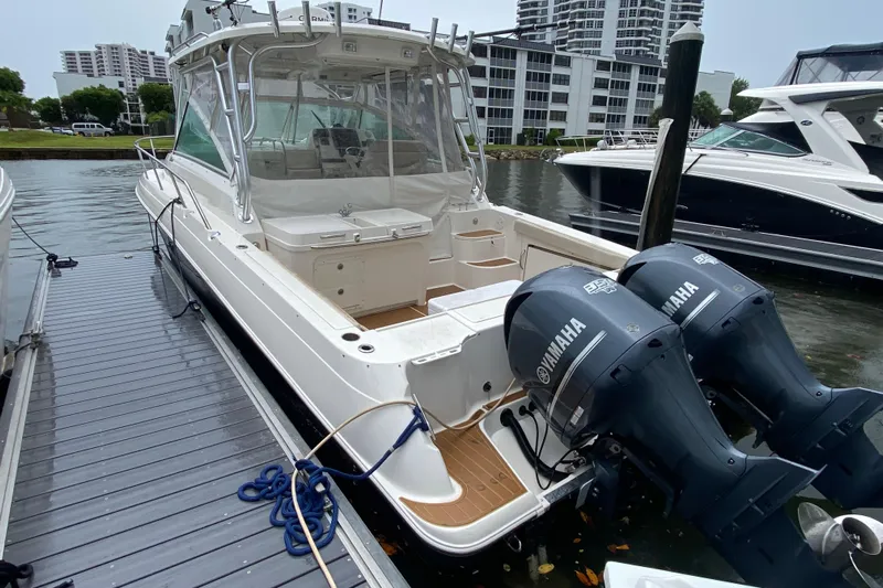  Yacht Photos Pics 2014 Wellcraft 340 Coastal boat docked with twin Yamaha engines.
