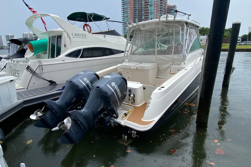  Yacht Photos Pics 2014 Wellcraft 340 Coastal boat docked with twin Yamaha outboard engines.
