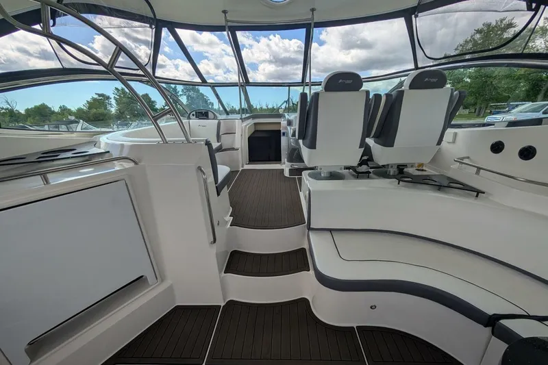  Yacht Photos Pics 2007 Cruisers Yachts 520 Express interior with sleek seating and modern design.