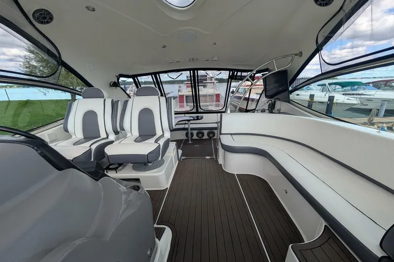  Yacht Photos Pics Luxurious interior of 2007 Cruisers Yachts 520 Express with elegant seating and modern design.