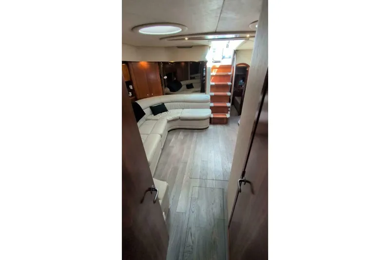  Yacht Photos Pics Luxurious interior of 2007 Cruisers Yachts 520 Express with elegant seating and wooden flooring.