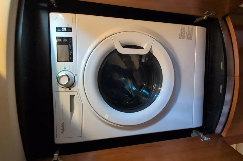  Yacht Photos Pics Washing machine inside 2007 Cruisers Yachts 520 Express, compact and efficient design.