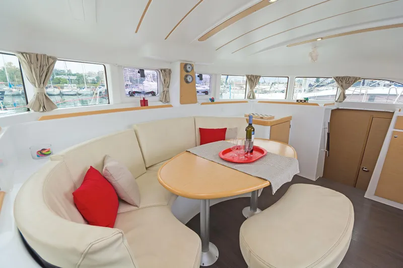 Cataki Yacht Photos Pics Interior of 2017 Lagoon 380 S2 catamaran with cozy seating and dining area.