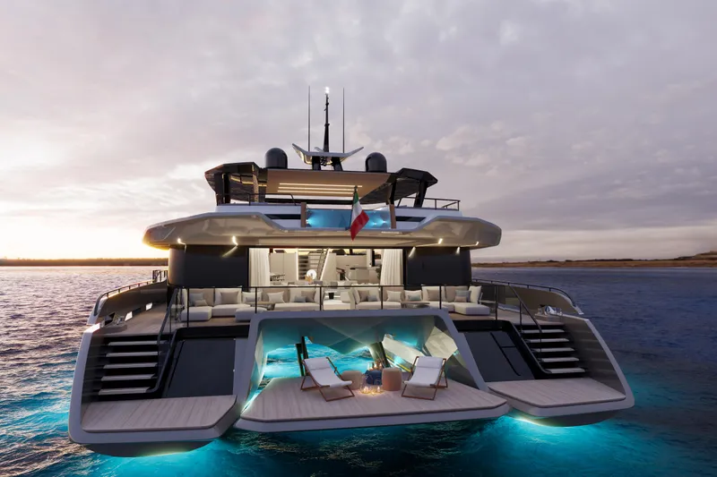 X30 Villa Yacht Photos Pics Luxury yacht Extra X30 VILLA 2026 at sunset with illuminated deck and lounge chairs.