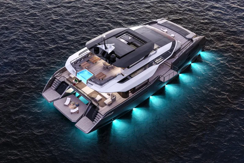 X30 Villa Yacht Photos Pics Luxury yacht Extra X30 VILLA 2026 with illuminated underwater lights at dusk.
