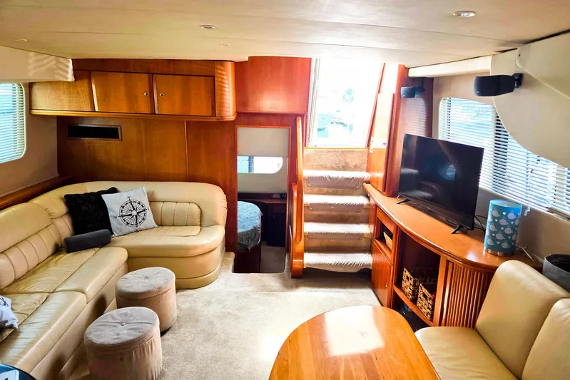  Yacht Photos Pics Luxurious interior of 2003 Silverton 392 Motor Yacht with plush seating and modern amenities.