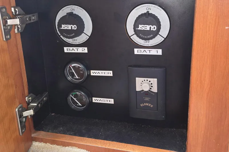  Yacht Photos Pics Control panel of a 2003 Silverton 392 Motor Yacht with battery and gauge indicators.