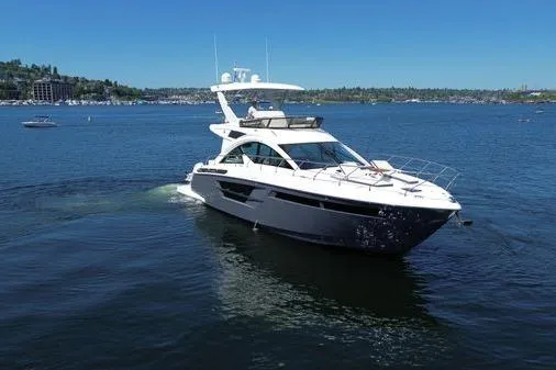 Fly Bridge Motor Yacht Yacht Photos Pics 2018 Cruisers Cantius yacht cruising on a sunny lake.