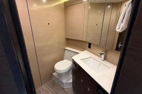 Fly Bridge Motor Yacht Yacht Photos Pics Luxurious bathroom in 2018 Cruisers Cantius yacht with modern fixtures and sleek design.