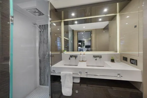 Fly Bridge Motor Yacht Yacht Photos Pics Luxurious 2018 Cruisers Cantius yacht bathroom with dual sinks and modern shower.