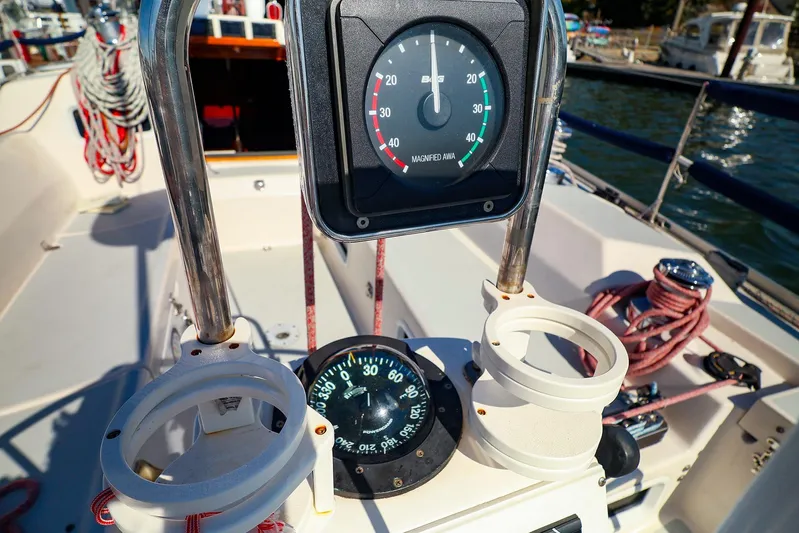 Hamburg II Yacht Photos Pics Cockpit view of 2002 J Boats J/46 sailboat with compass and wind gauge.