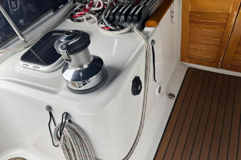 Lumiere Yacht Photos Pics Cockpit of 2007 Beneteau 49 sailboat with winch and ropes.
