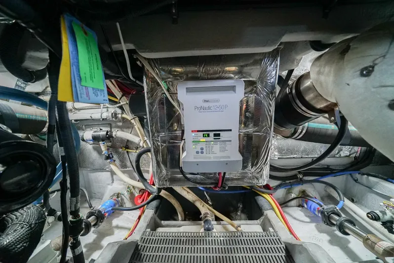 Poseidon's Mistress Yacht Photos Pics Engine room of a 2007 Meridian 459 Motor Yacht with electrical components.