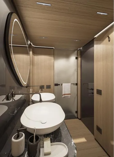 Sirena 42 Yacht Photos Pics Modern yacht bathroom with sleek design, oval mirror, and elegant fixtures, Custom Sirena 2026.