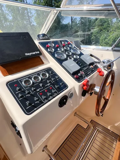 A'maure Yacht Photos Pics Control panel of a 2001 Apreamare 11 boat with Raymarine navigation system.