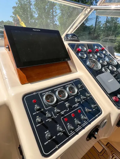 A'maure Yacht Photos Pics Control panel of a 2001 Apreamare 11 boat with navigation instruments and gauges.
